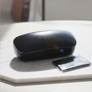 Coach leather case & cloth